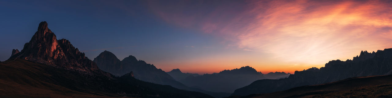 mountain, sky, landscape, environment, scenics - nature, panoramic, beauty in nature, sunset, mountain range, nature, travel destinations, cloud, travel, mountain peak, dawn, land, sun, rock, no people, dramatic sky, activity, tourism, tranquility, outdoors, twilight, silhouette, tranquil scene, awe, valley, sunlight, non-urban scene, holiday, evening, trip, idyllic, vacation