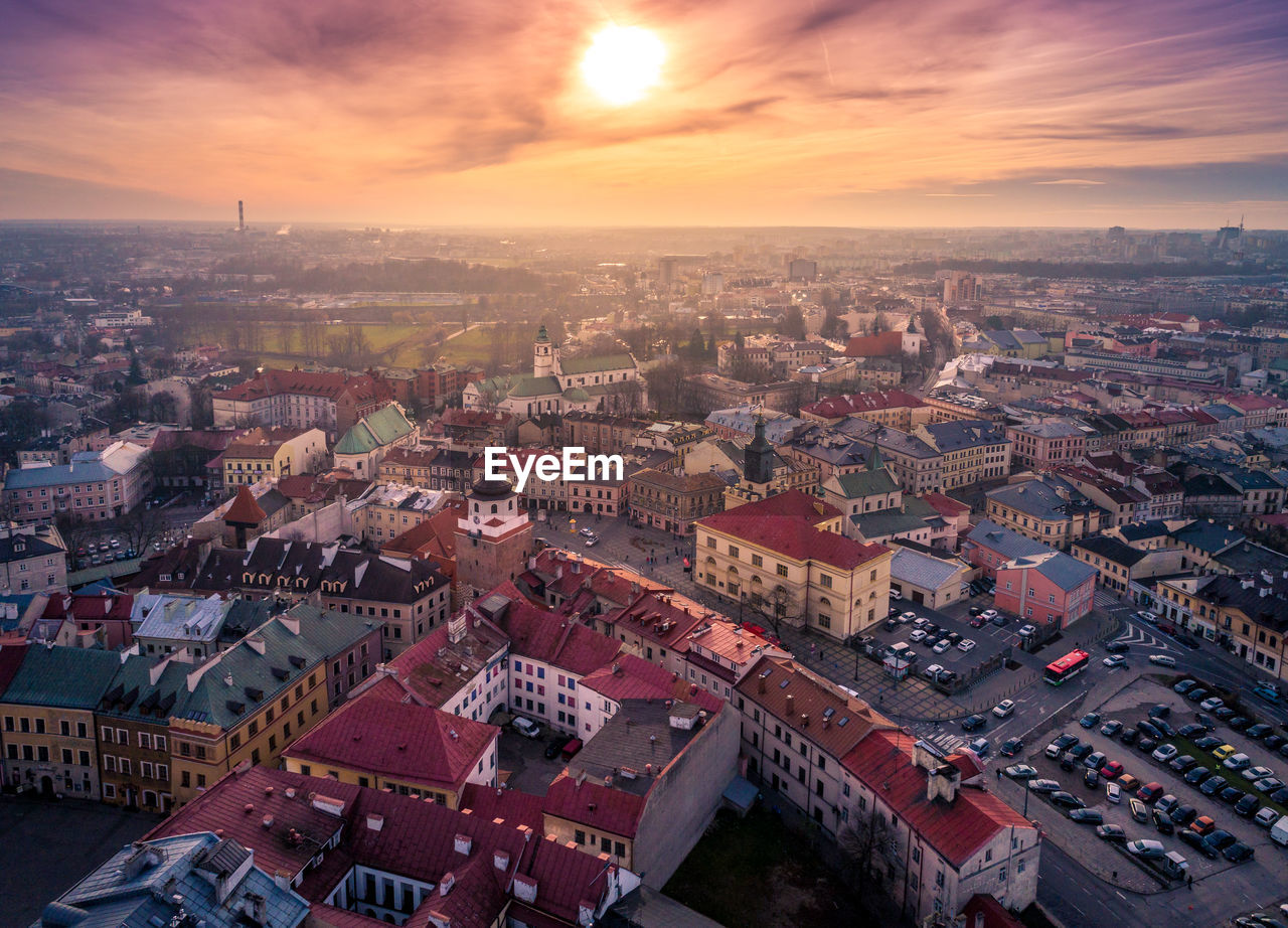 Aerial view of cityscape against sky