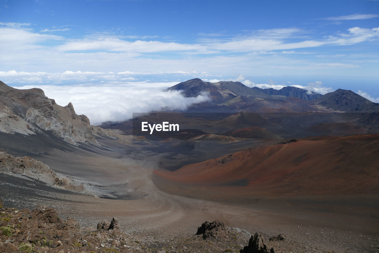 Panoramic view of volcanic landscape against sky