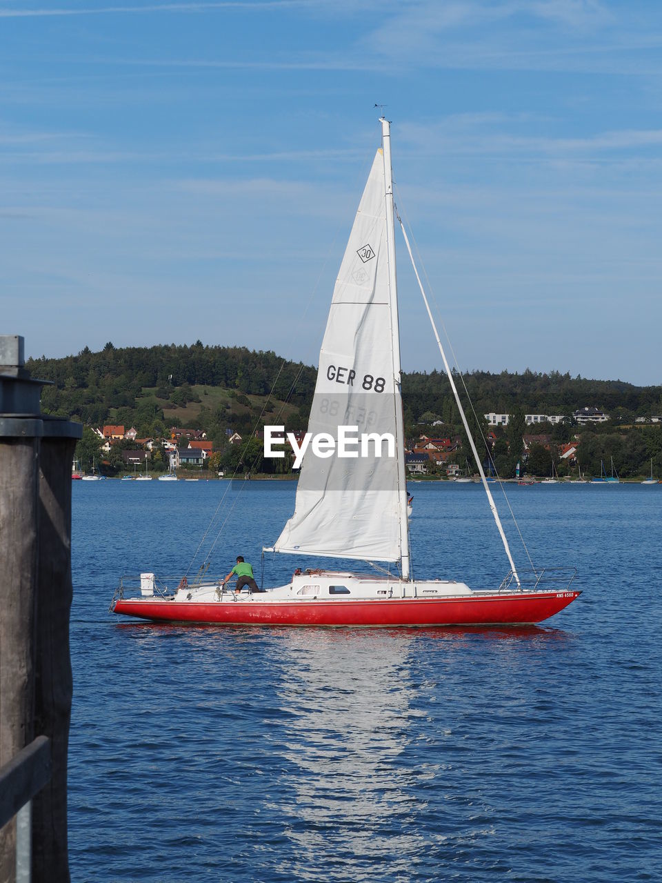 SAILBOAT SAILING IN SEA