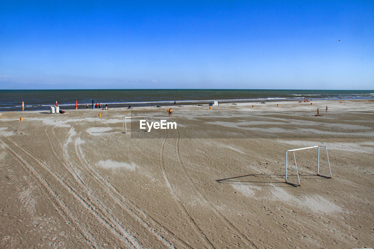 VIEW OF BEACH AGAINST CLEAR SKY