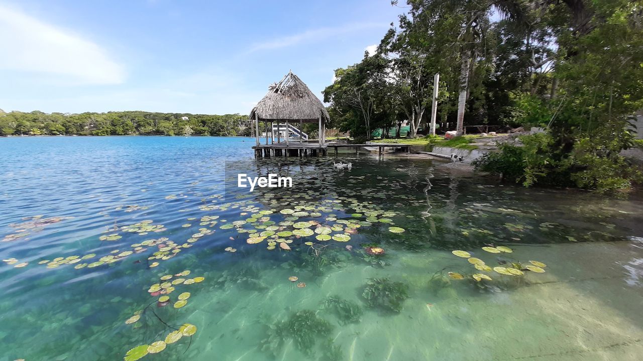 GAZEBO IN LAKE AGAINST SKY