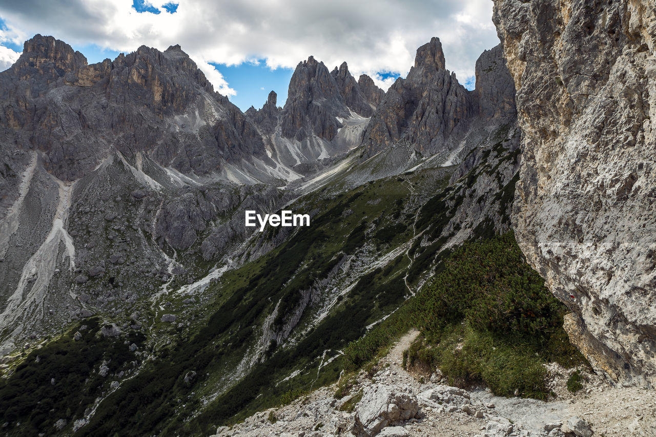 Cadini di misurina panorama on hiking mountain path, trentino, italy