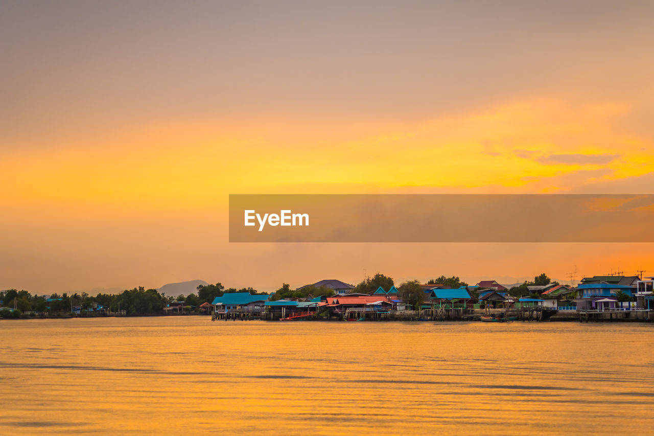 Scenic view of sea against romantic sky at sunset