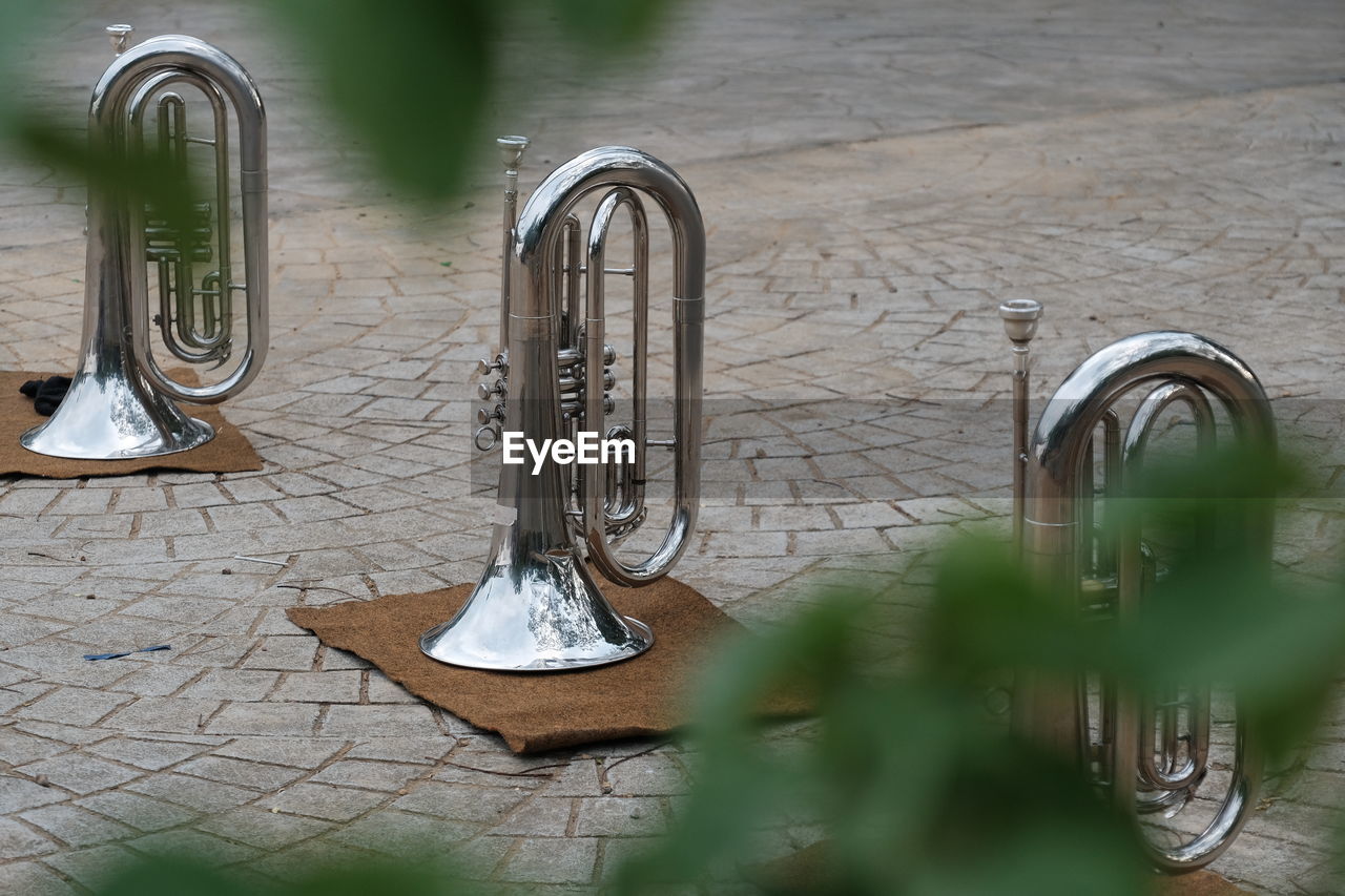 HIGH ANGLE VIEW OF FAUCET IN BATHROOM