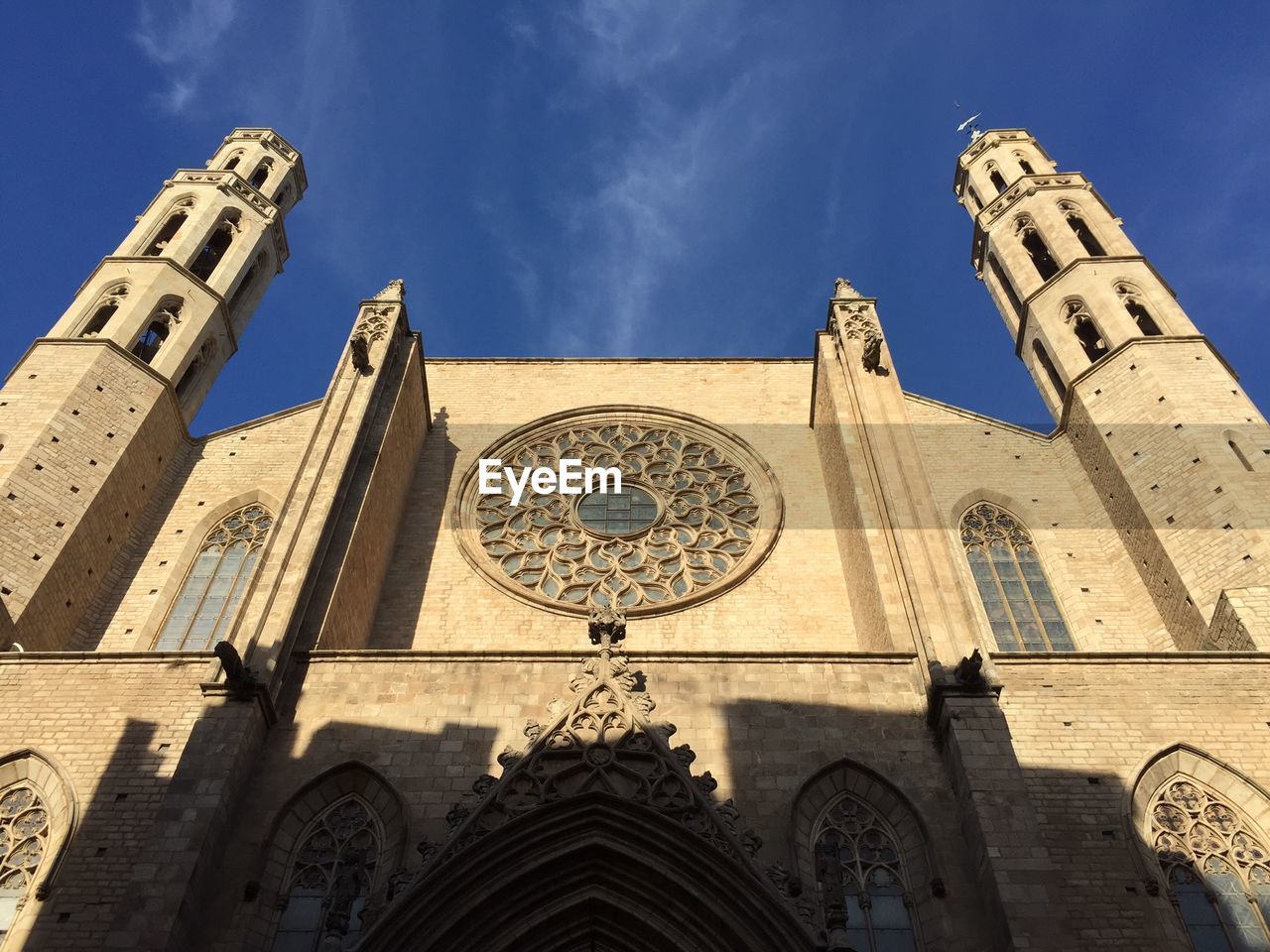 Low angle view of historic church against sky