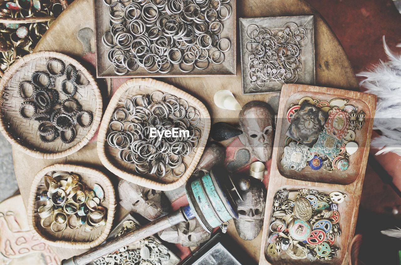 HIGH ANGLE VIEW OF OLD OBJECTS ON TABLE IN KITCHEN