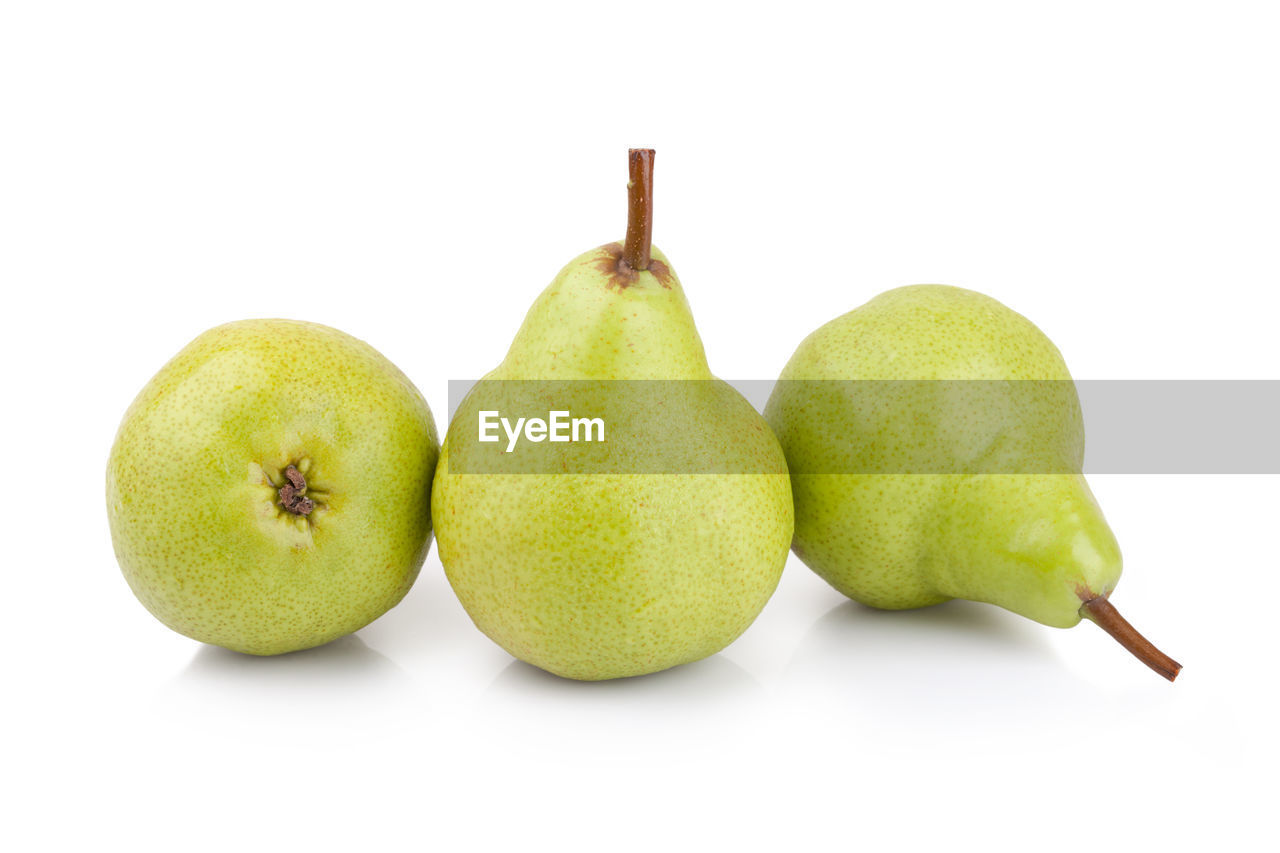 Close-up of pear against white background