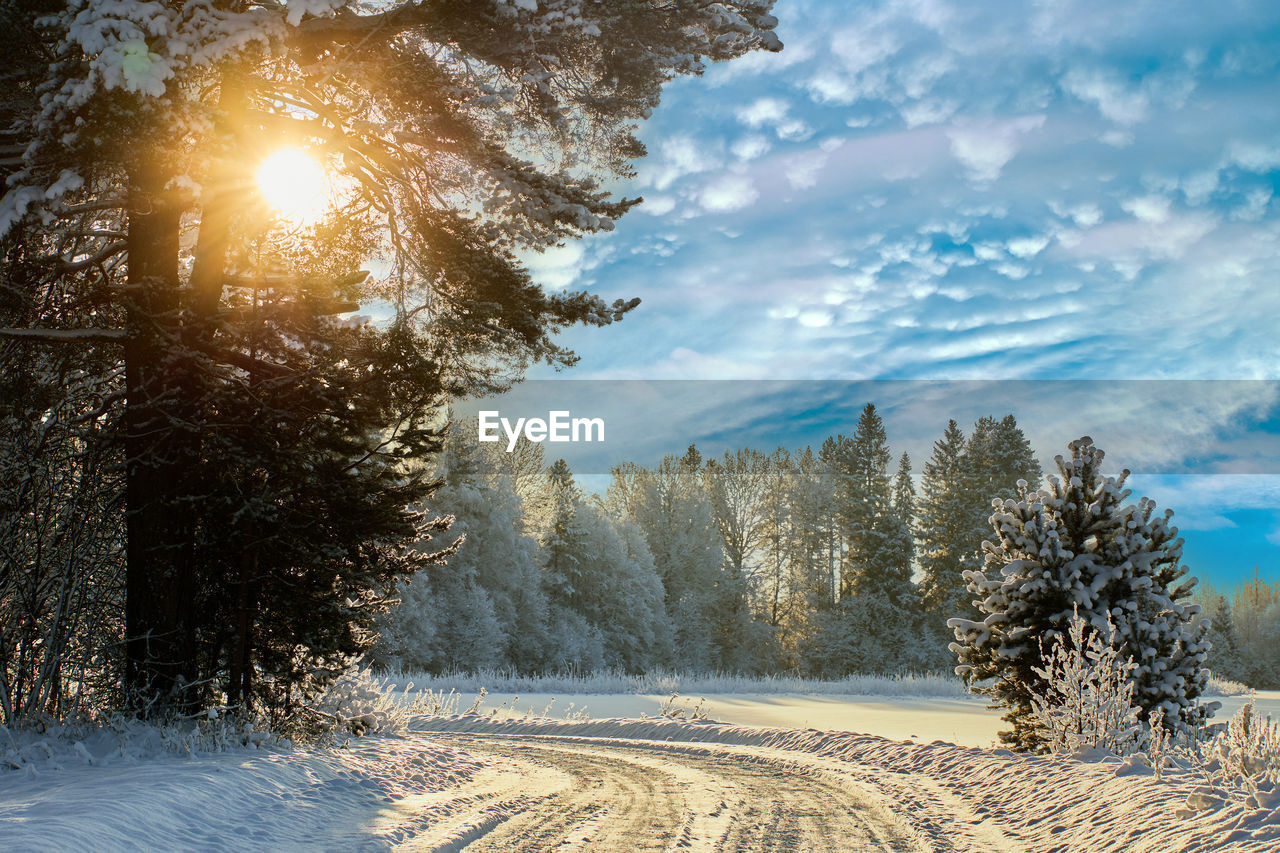 scenic view of snow covered landscape against sky