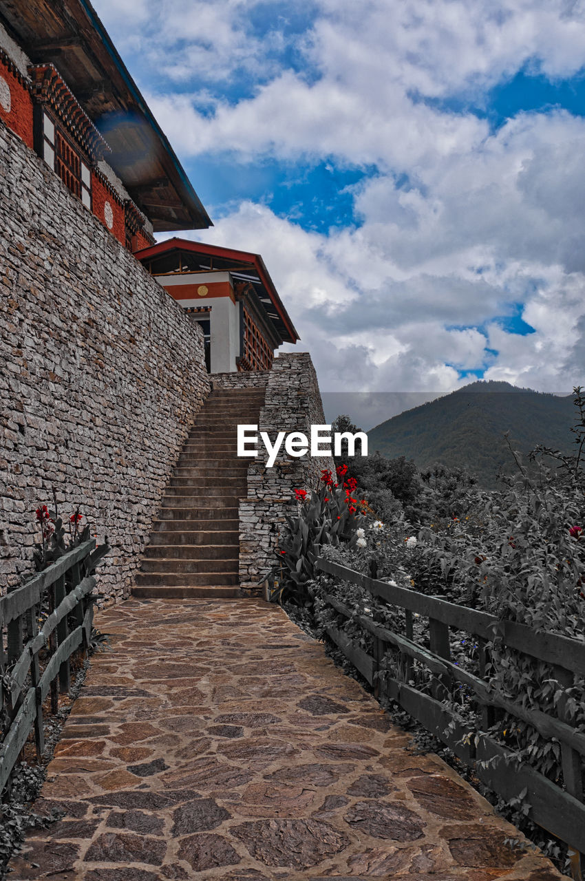 Main entrance stairs of dechen phodrang, an old monastery in thimphu, bhutan