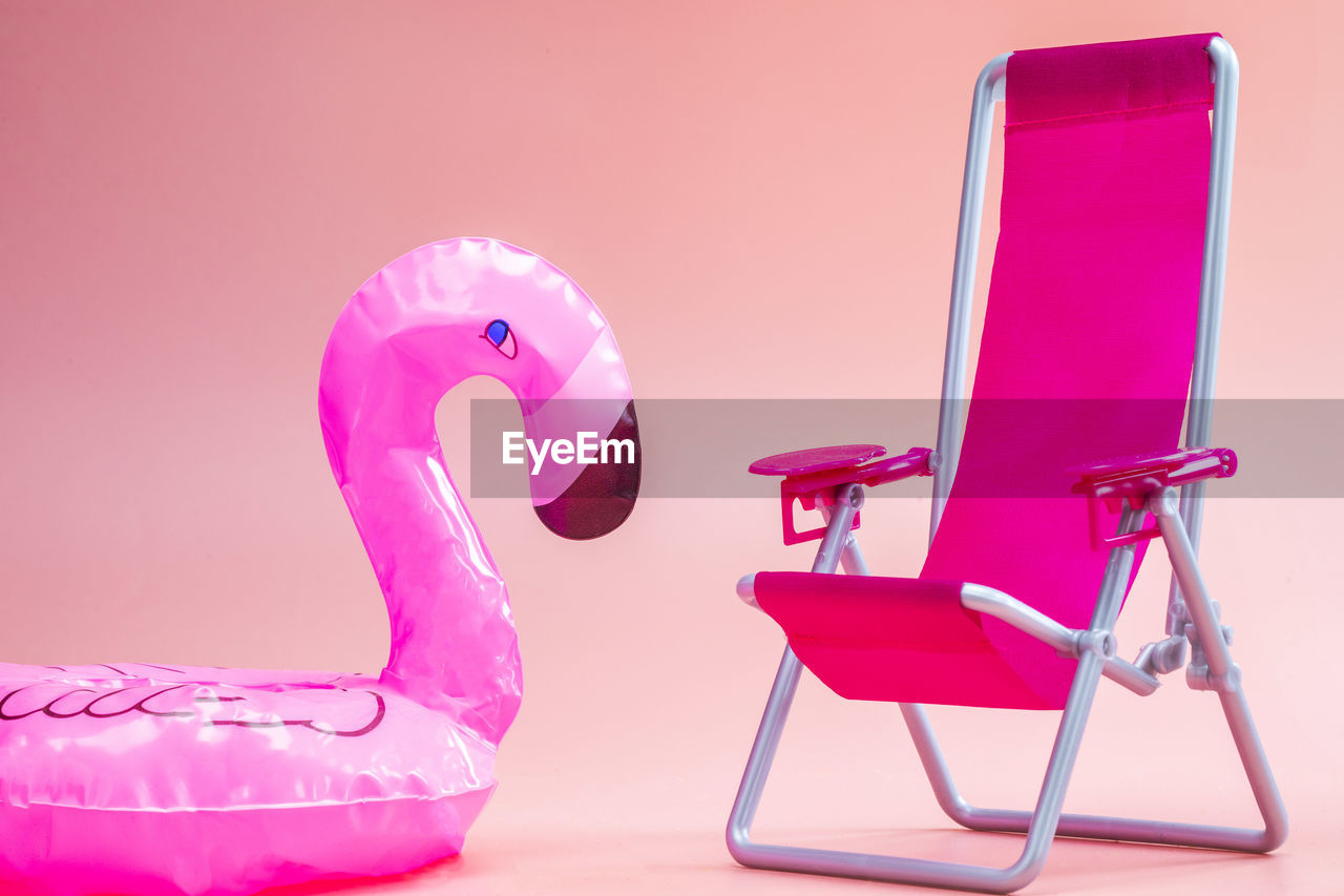 pink, chair, furniture, studio shot, indoors, no people, magenta, seat, colored background, purple, cartoon