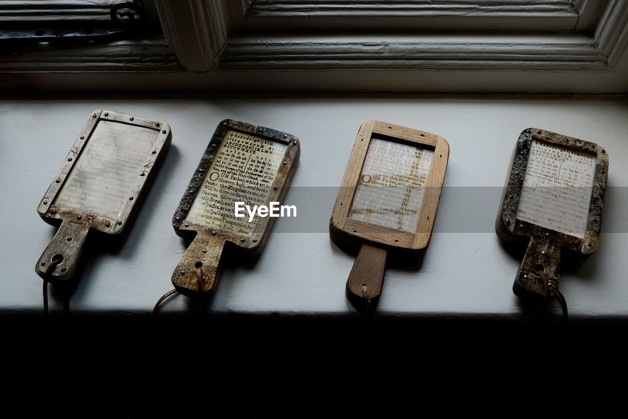 High angle view of prayer box on window sill