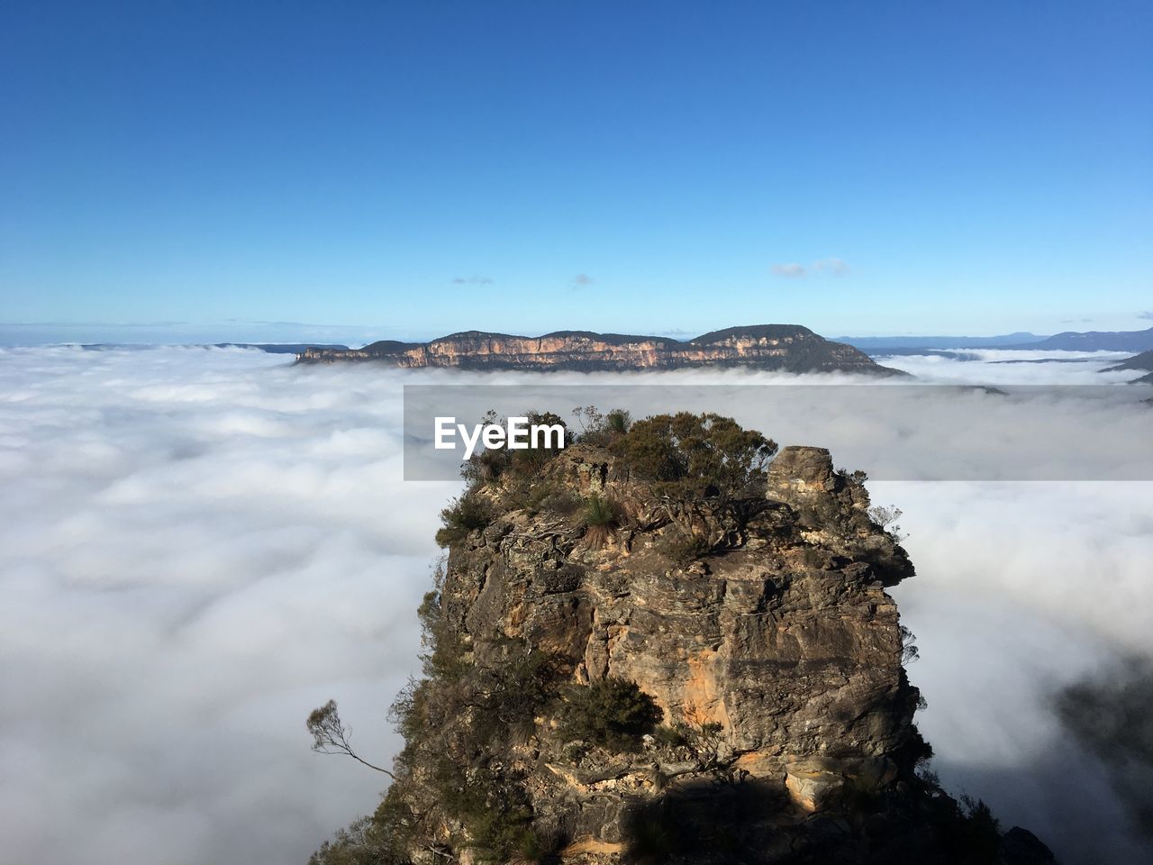 Scenic view of sea against blue sky