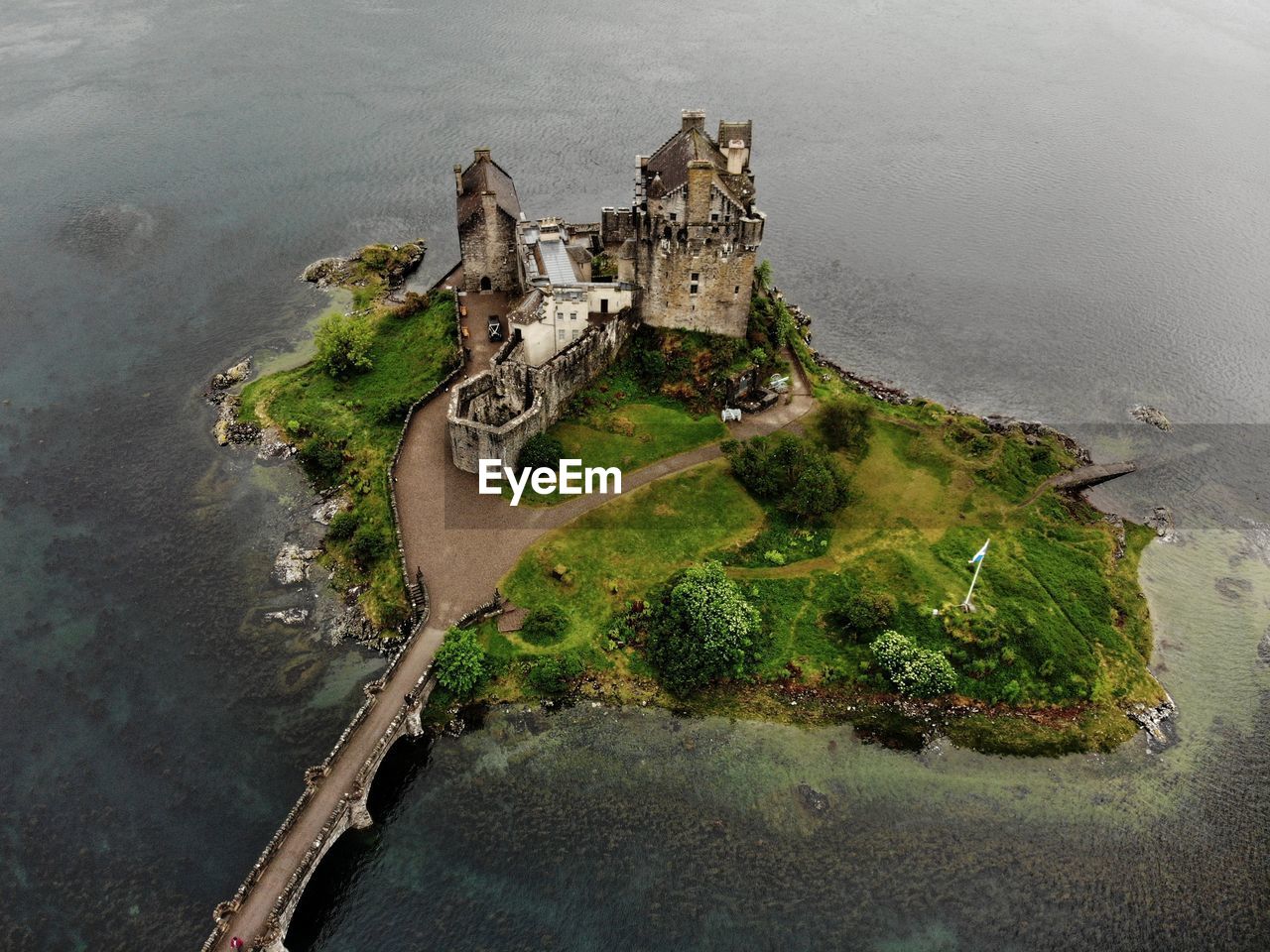 High angle view of old castle on shore