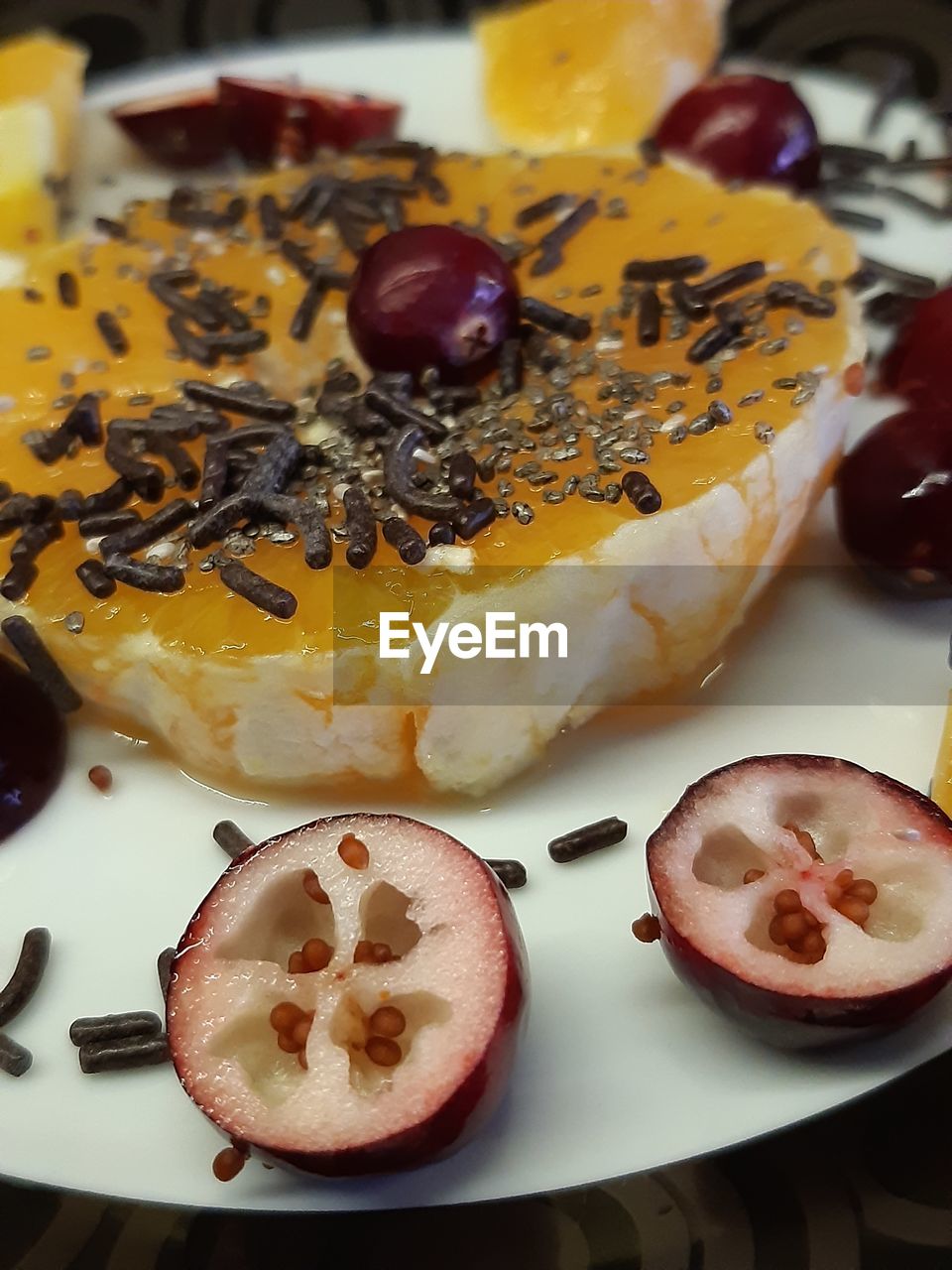 HIGH ANGLE VIEW OF DESSERT SERVED ON PLATE