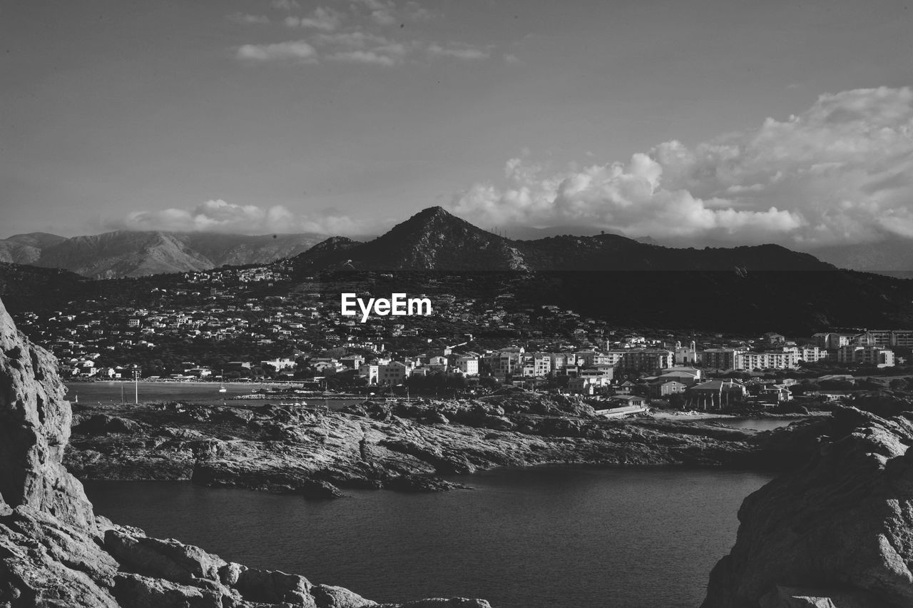 AERIAL VIEW OF TOWNSCAPE BY SEA