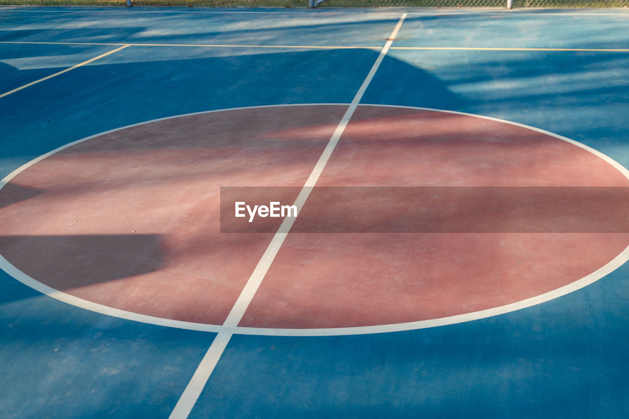 low angle view of basketball in blue sky