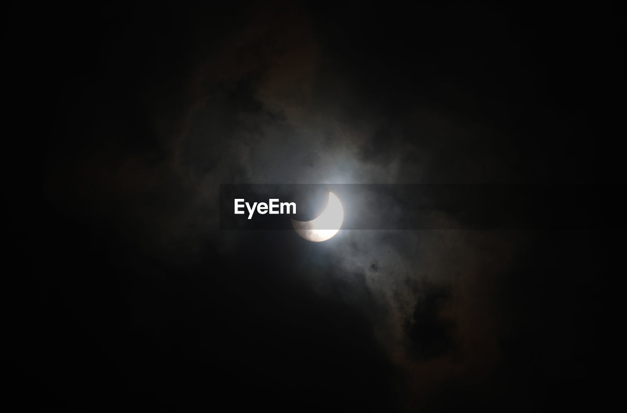 LOW ANGLE VIEW OF MOON AGAINST SKY