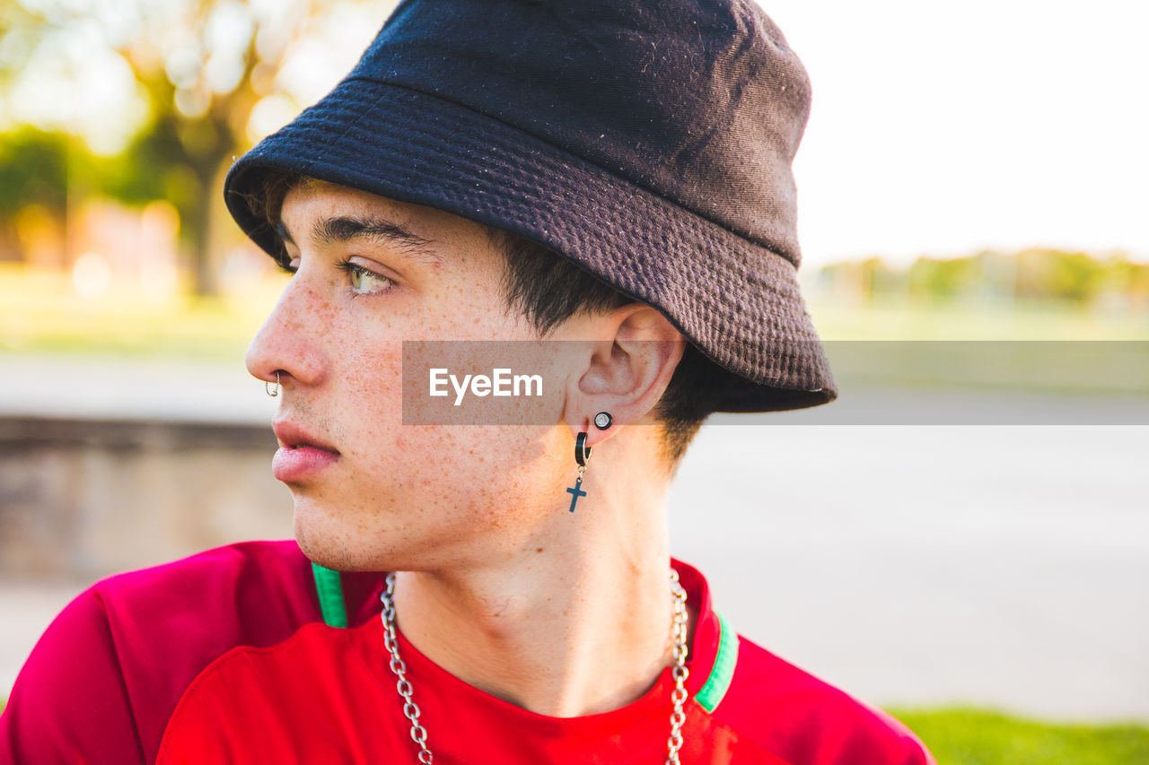 Close-up of young man looking away