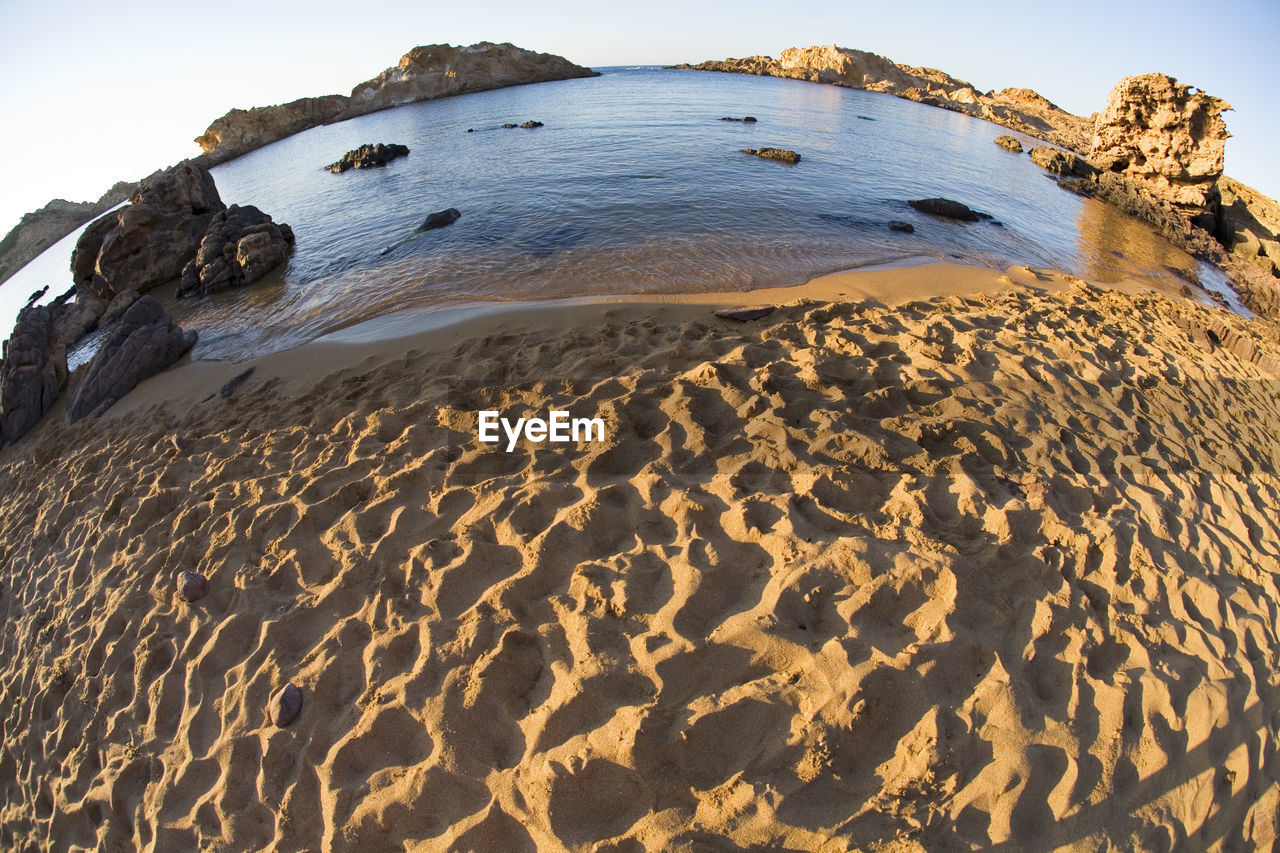 Scenic view of sea against clear sky