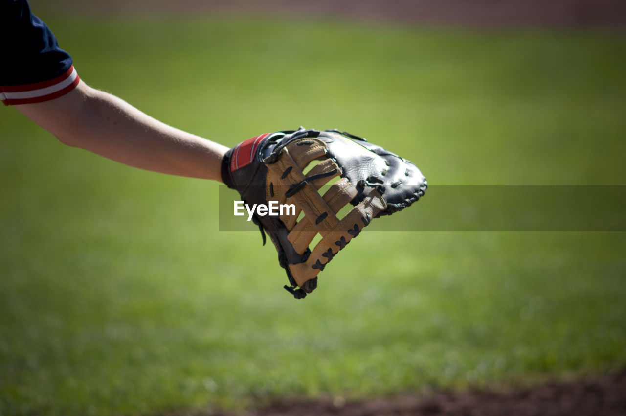 Close-up of first baseman's glove reaching out
