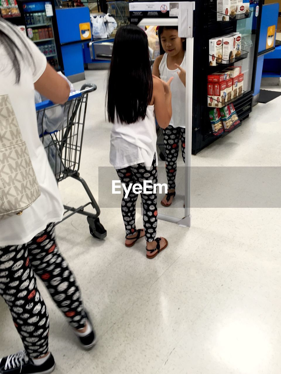 WOMAN LOOKING AT CAMERA