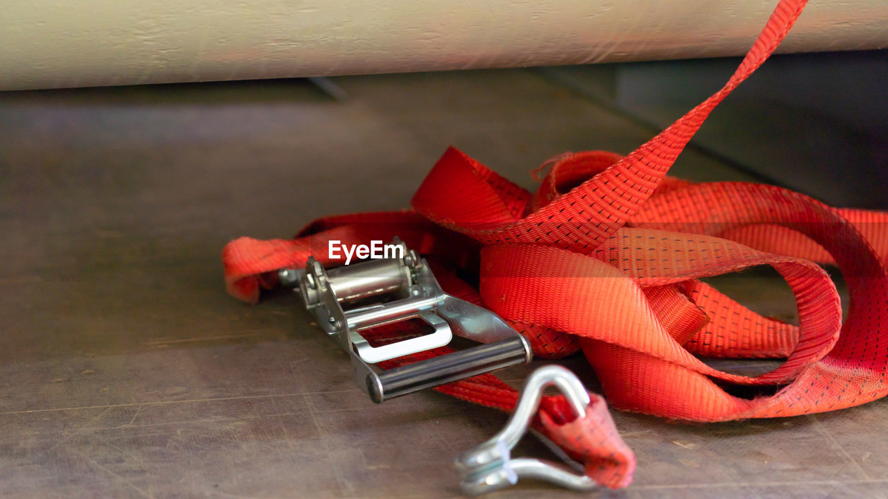 red, footwear, pink, no people, indoors, orange, still life, fashion accessory, shoe, holiday, table, wood