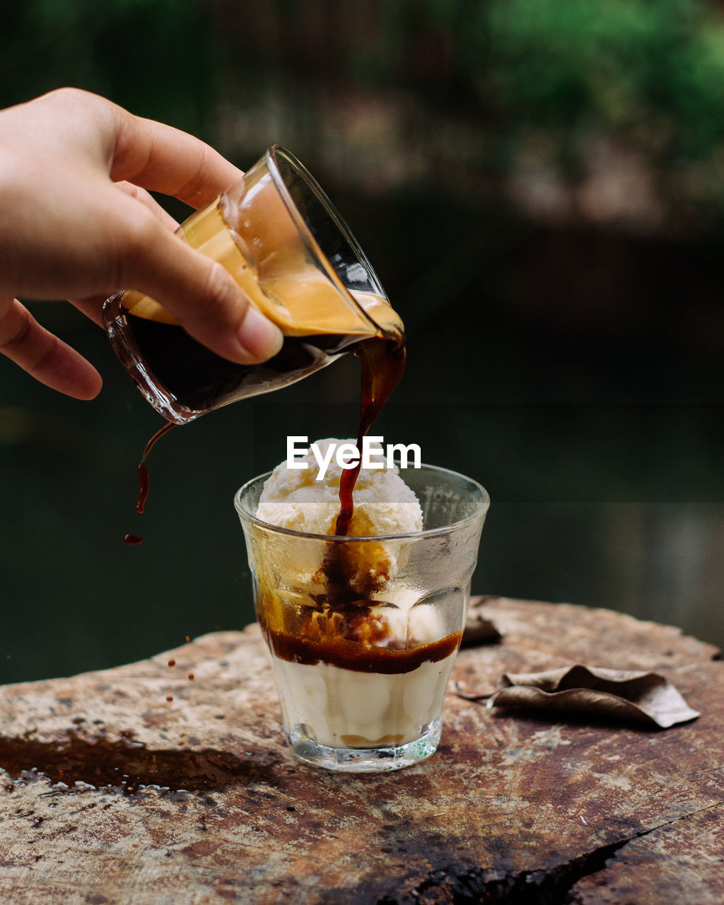 Close-up of hand holding drink