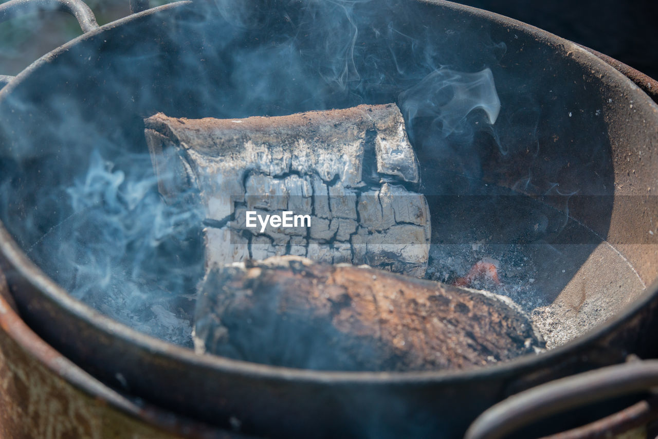 Close-up of wood in fire pit