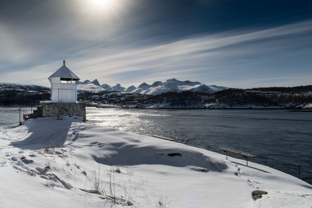 Scenic view of sea against sky during winter