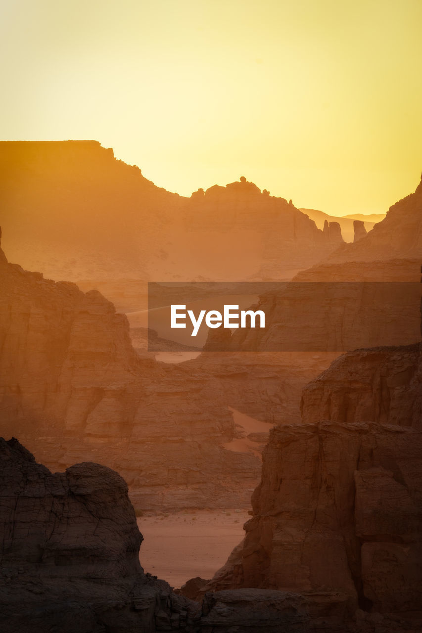 scenic view of mountains during sunset