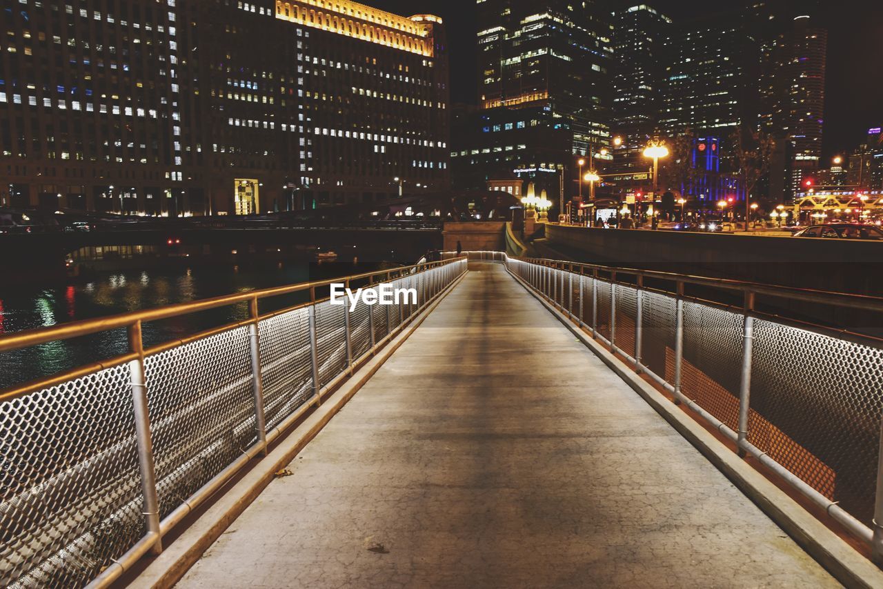 Lighted walking path in the city at night