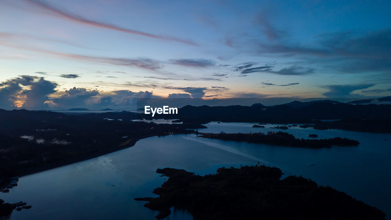 Aerial view of kenyir lake during blue hour sunrise.