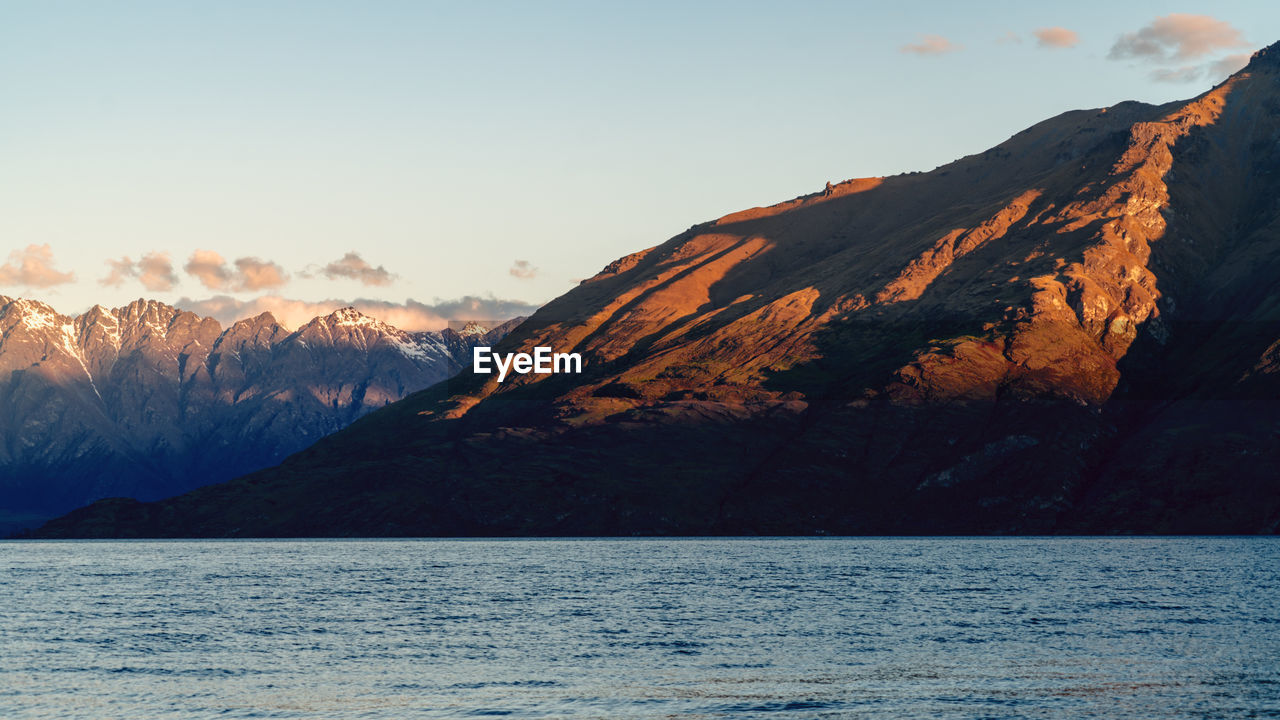 Scenic view of mountains against sky during sunset
