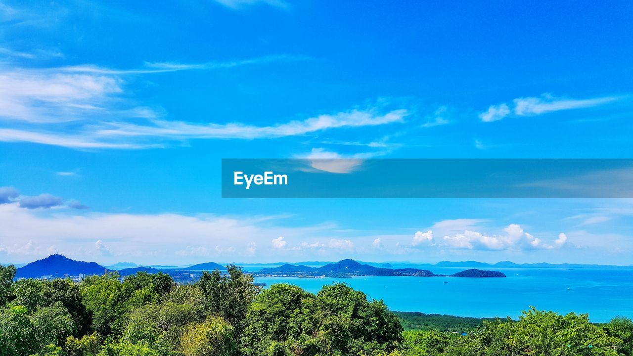 Scenic view of sea against blue sky