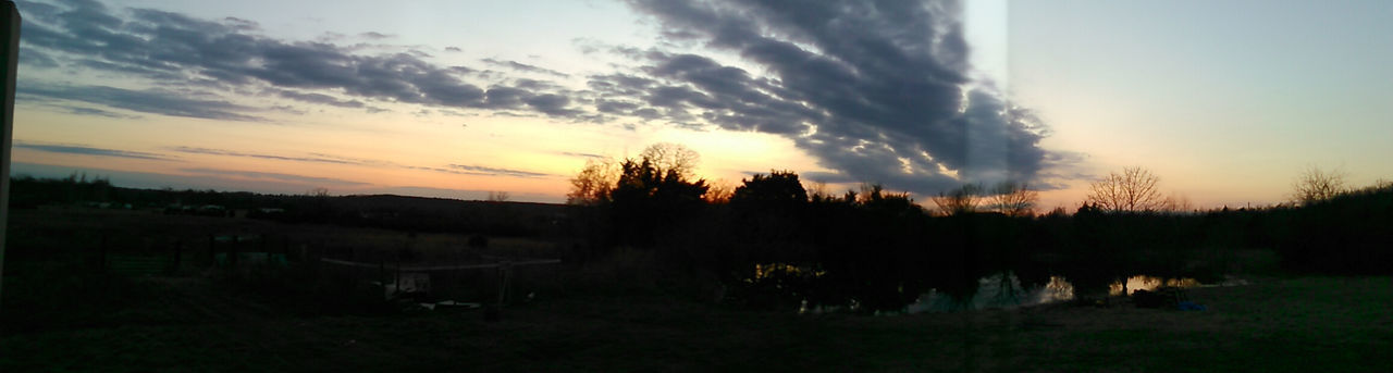 SCENIC VIEW OF LANDSCAPE AT SUNSET