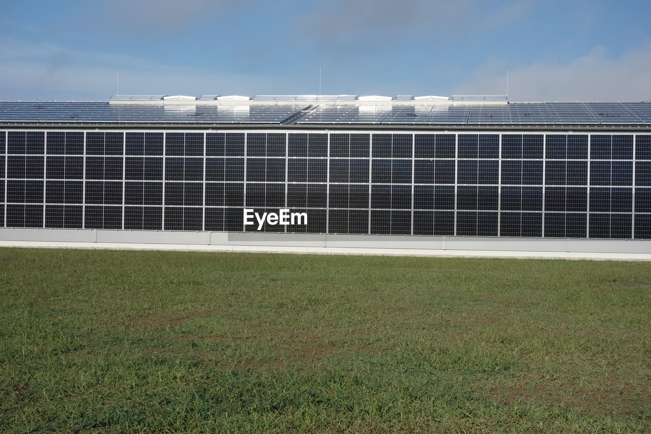 Solar panels on a house, using renewable energy in modern buildings