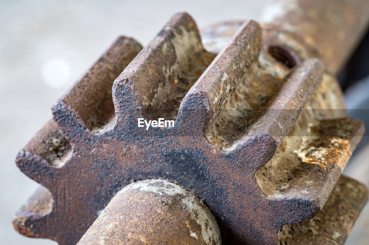 CLOSE-UP OF RUSTY MACHINE