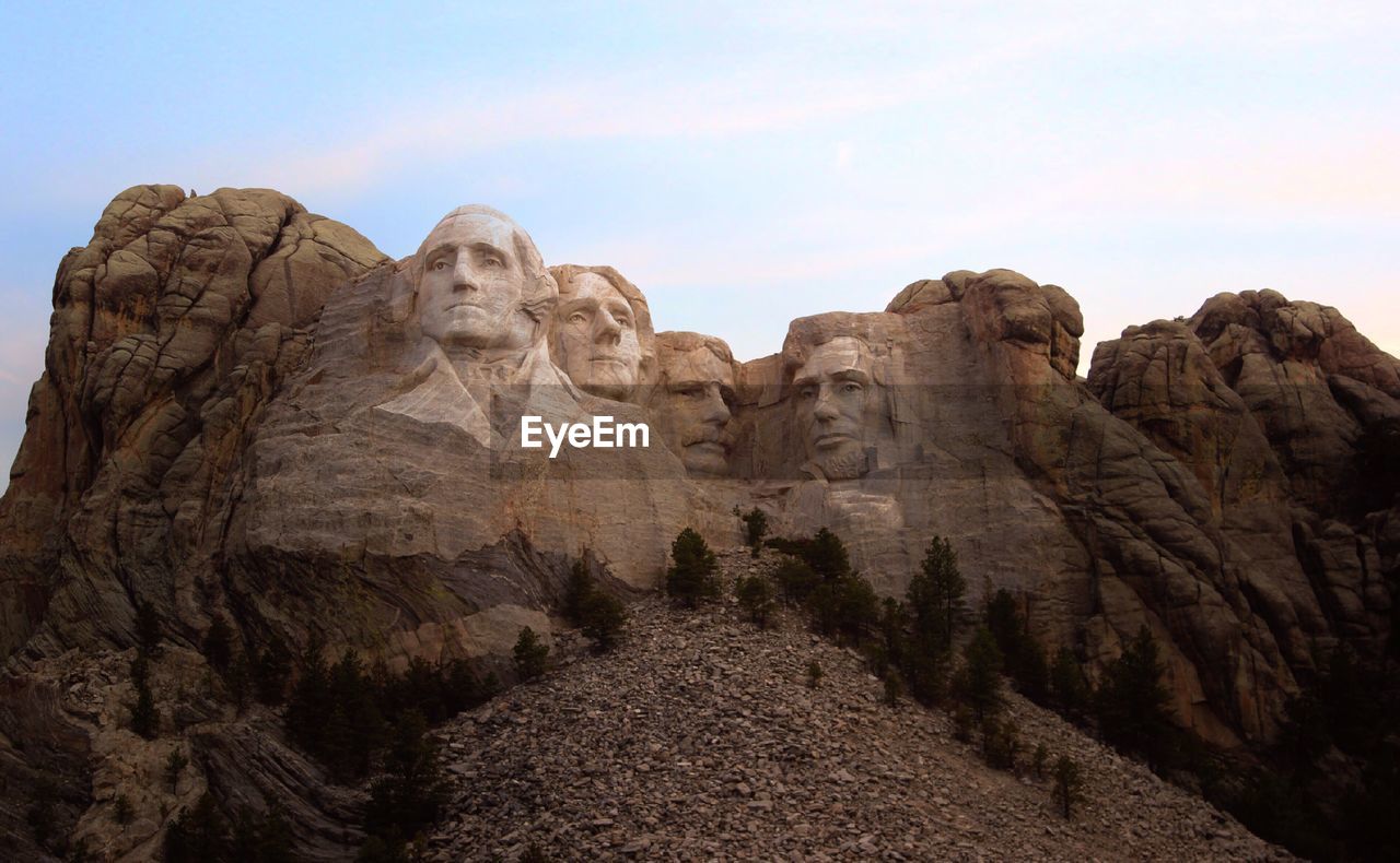 Low angle view of mount rushmore against the sky