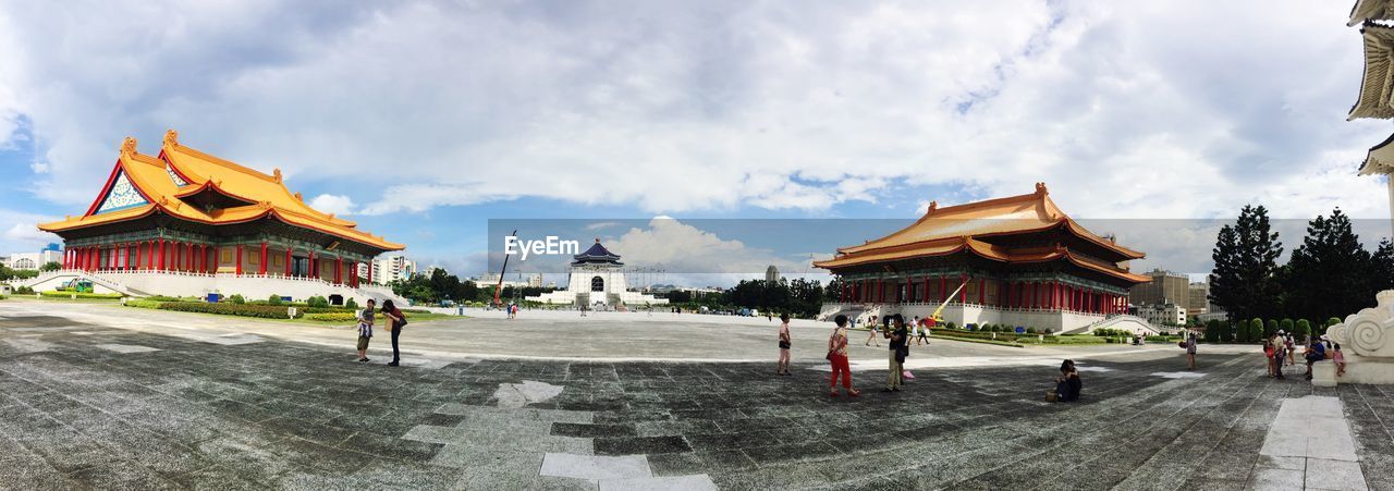 TOURISTS VISITING TEMPLE