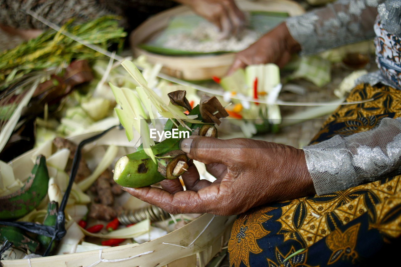 Someone prepares the equipment for the ngaben ceremony in ubud bali indonesia.