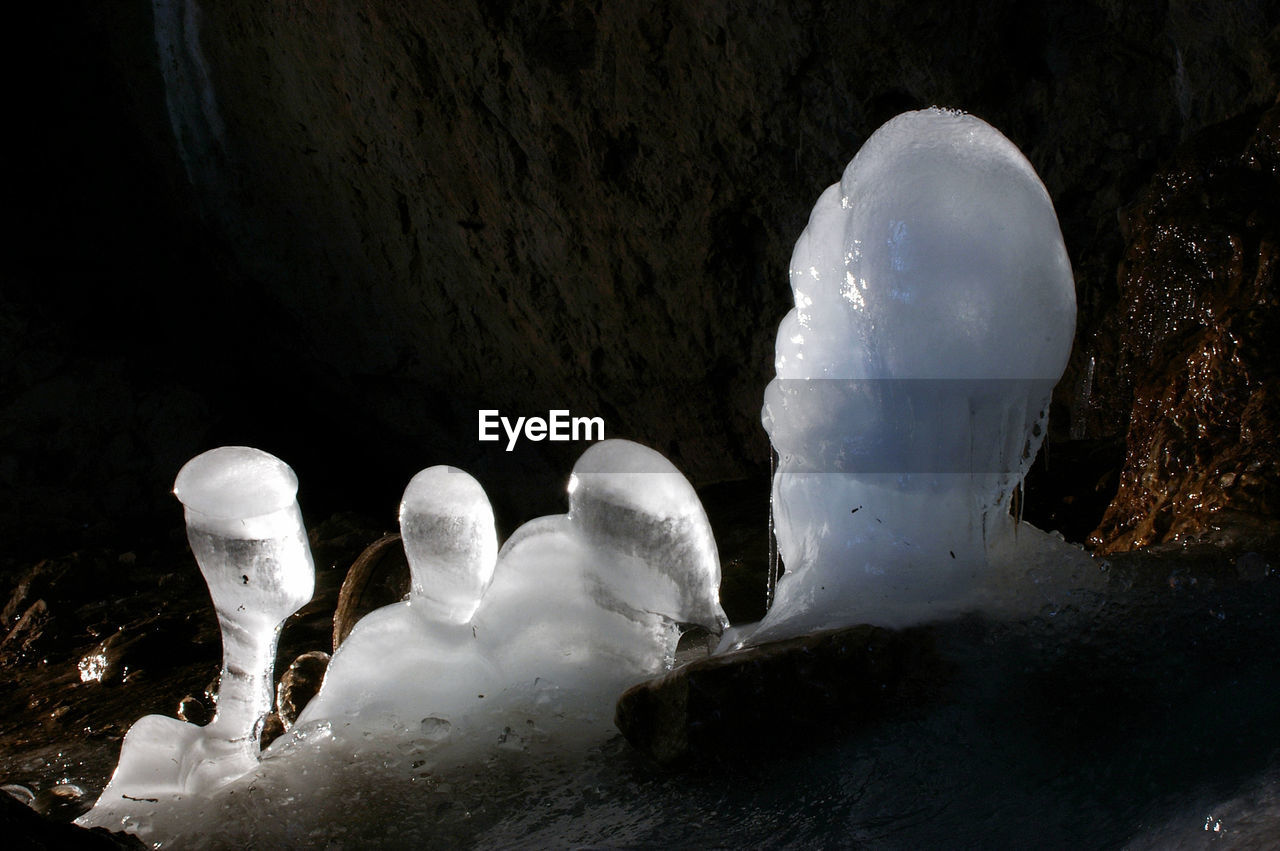 Ice stalagmites in ice cave. scarisoara, romania