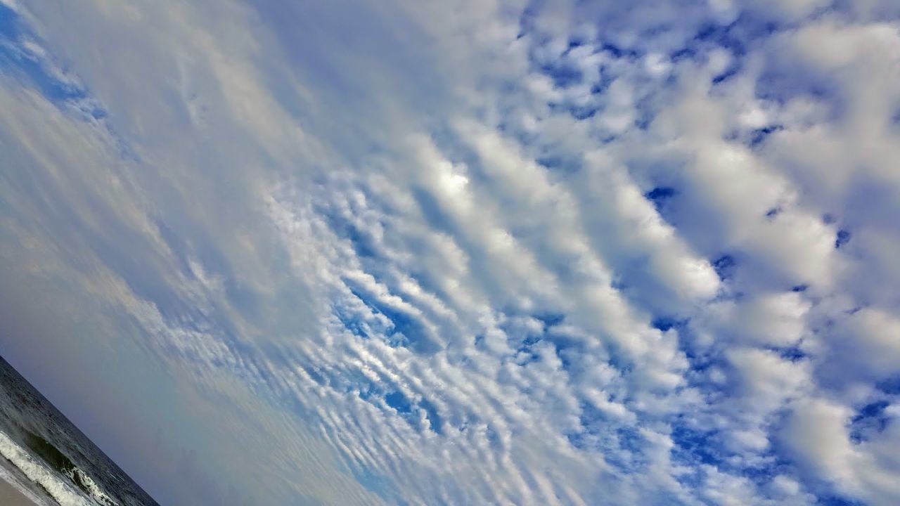 LOW ANGLE VIEW OF SKY OVER CLOUDS