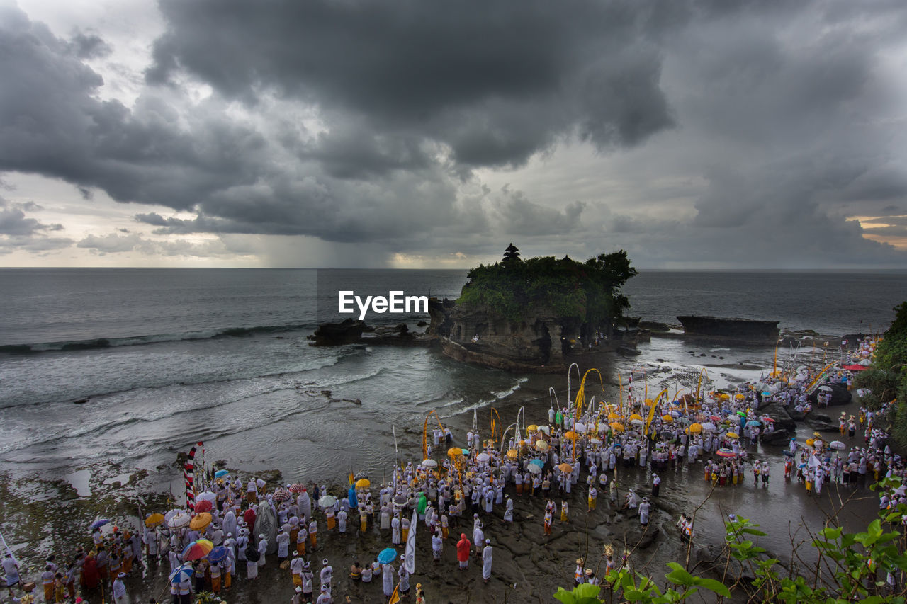 High angle view of people at beach during traditional festival