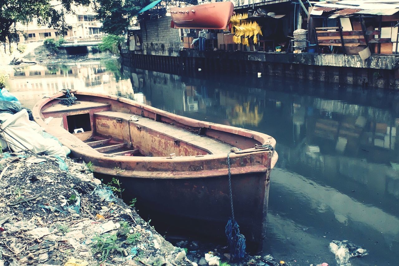 Boats moored on shore