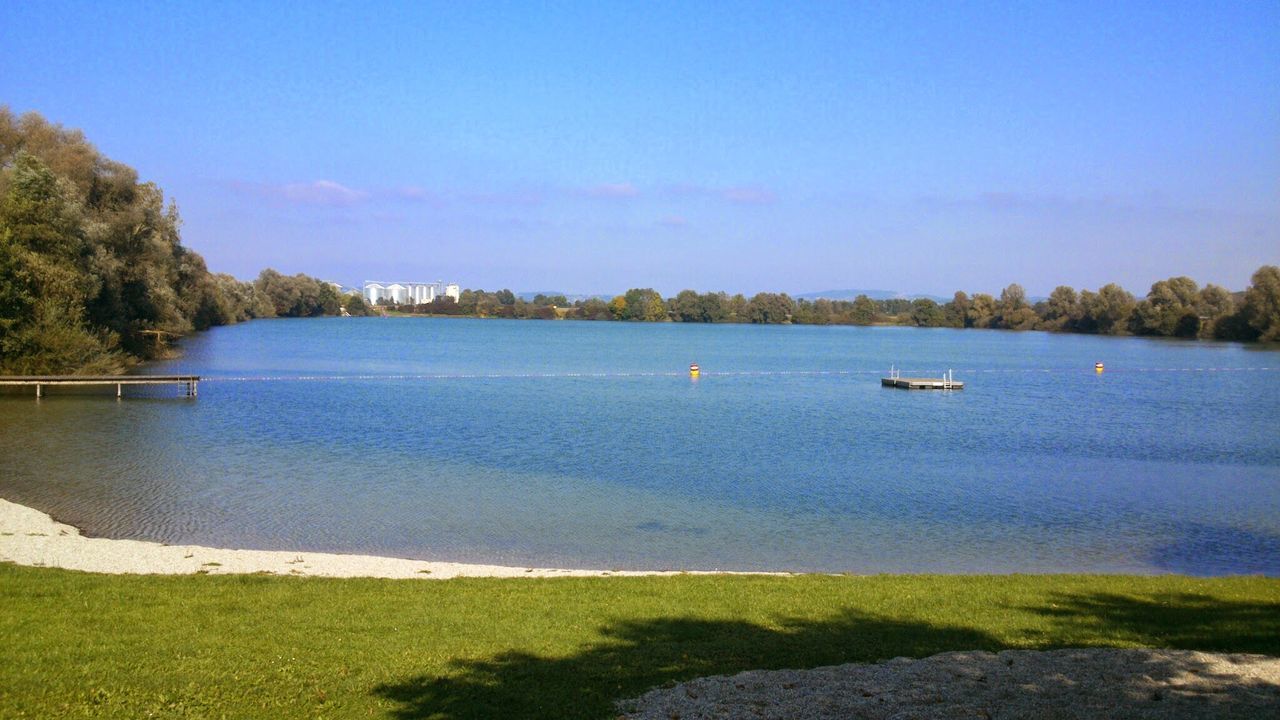 SCENIC VIEW OF CALM LAKE