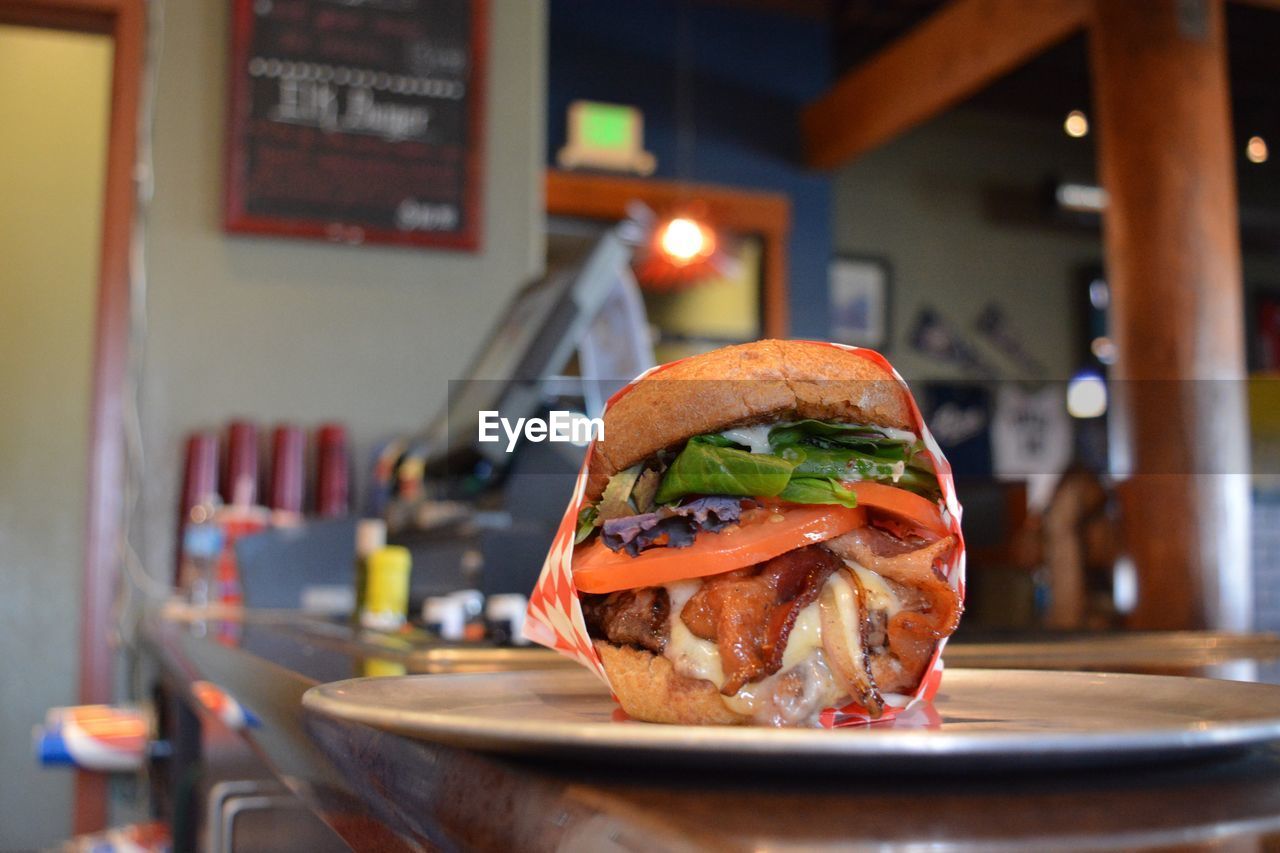 Close-up of burger on table in restaurant