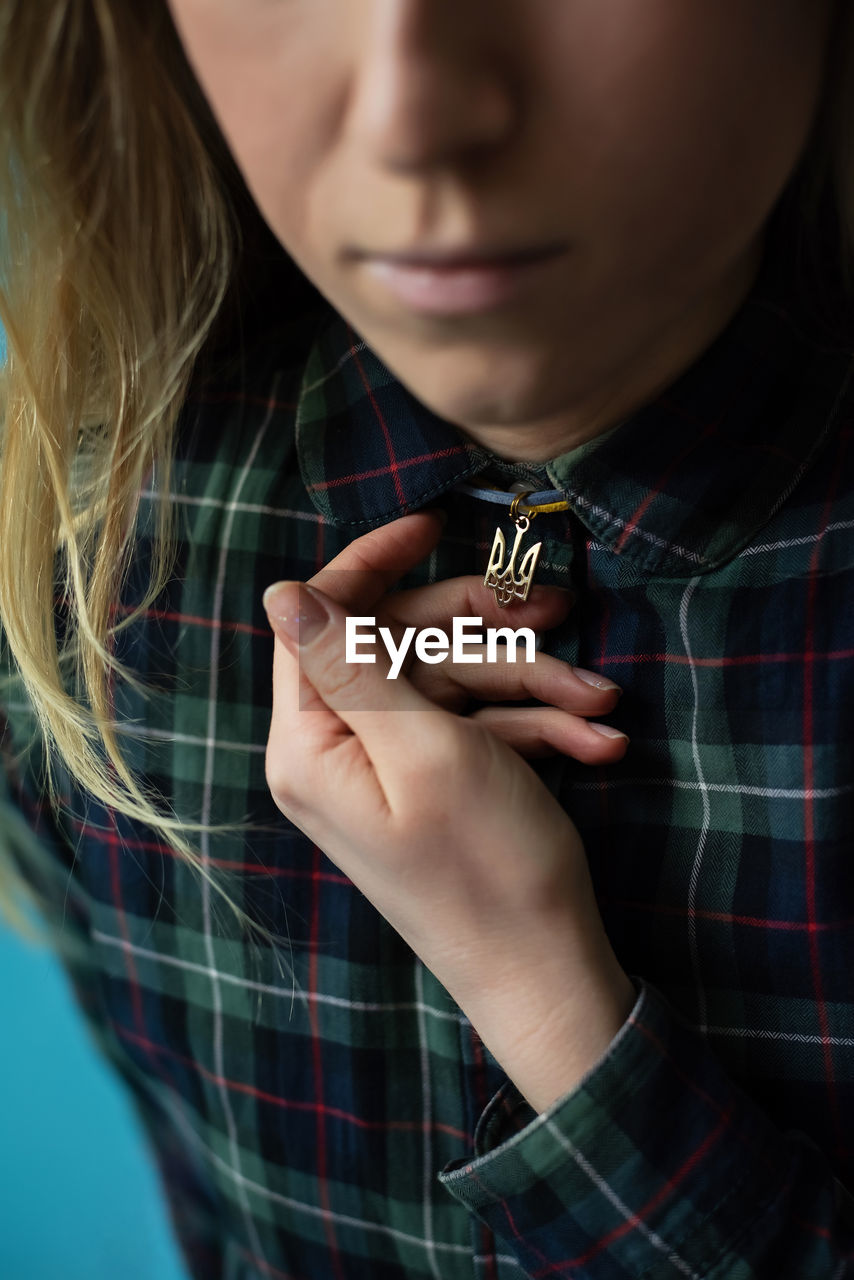 Ukrainian woman with the national emblem trident