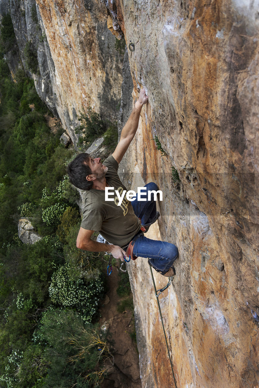 Man climbing on rock