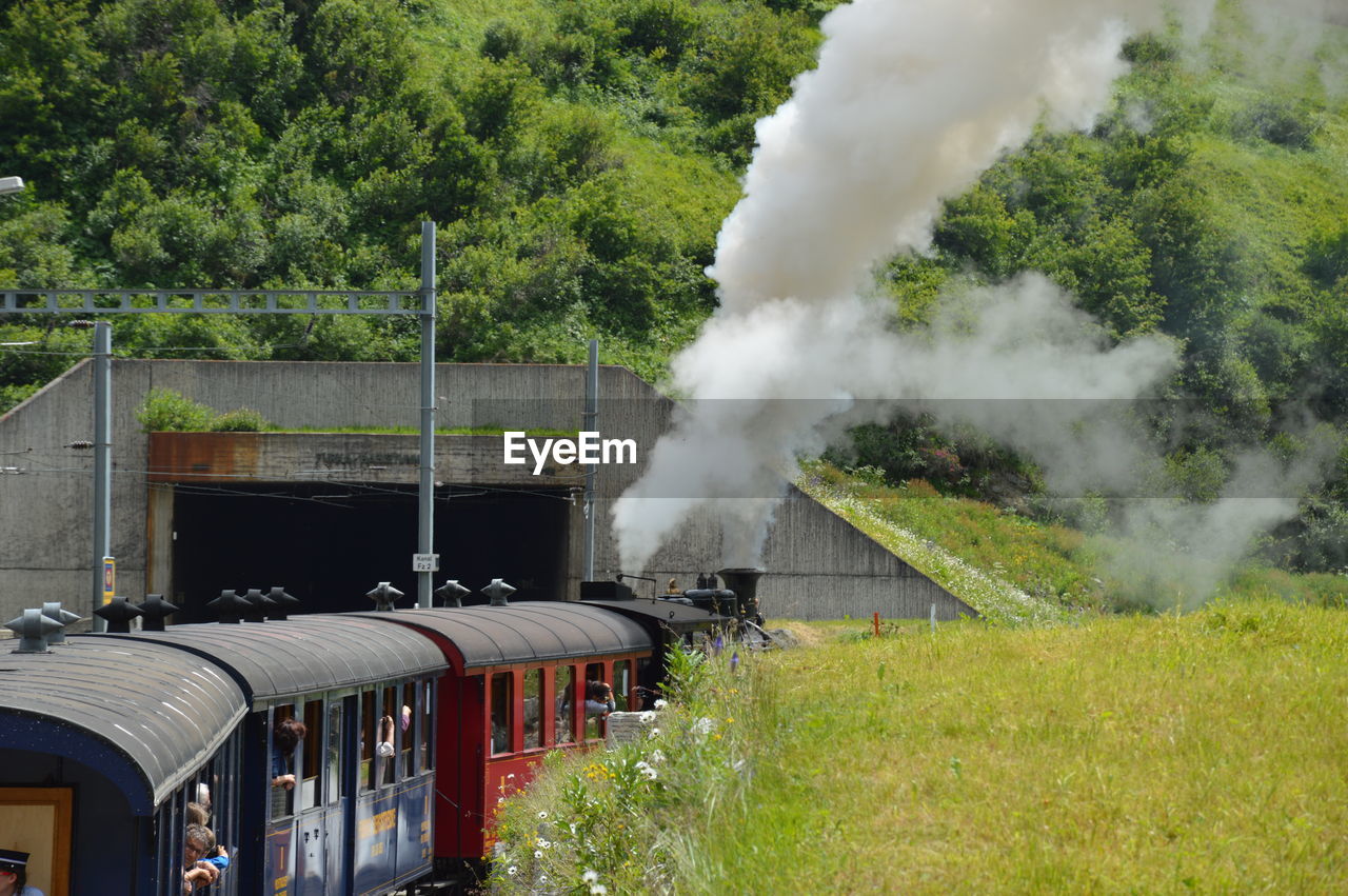 Passengers in steam train